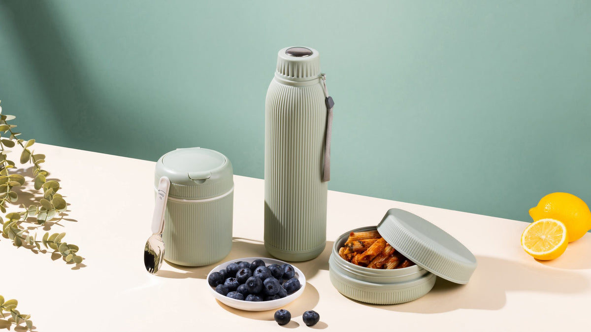 Jaypee insulated flask and lunch set styled with fruit