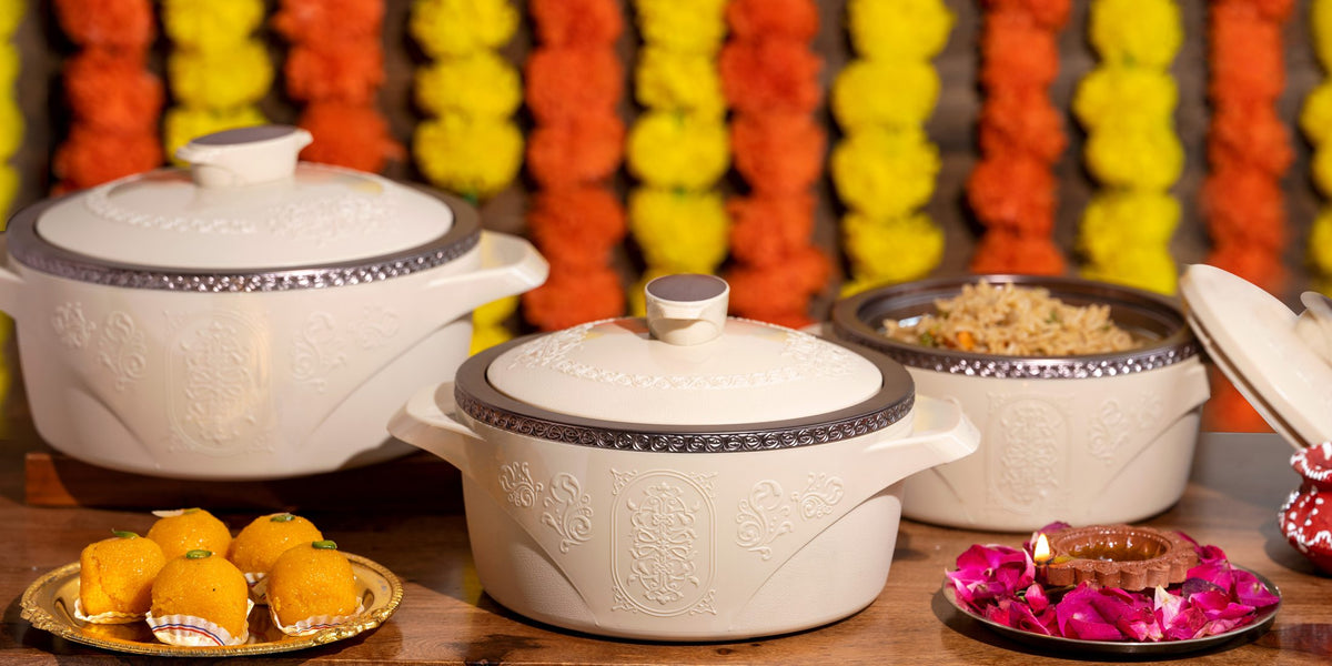Jaypee insulated casseroles on a festive table with marigolds